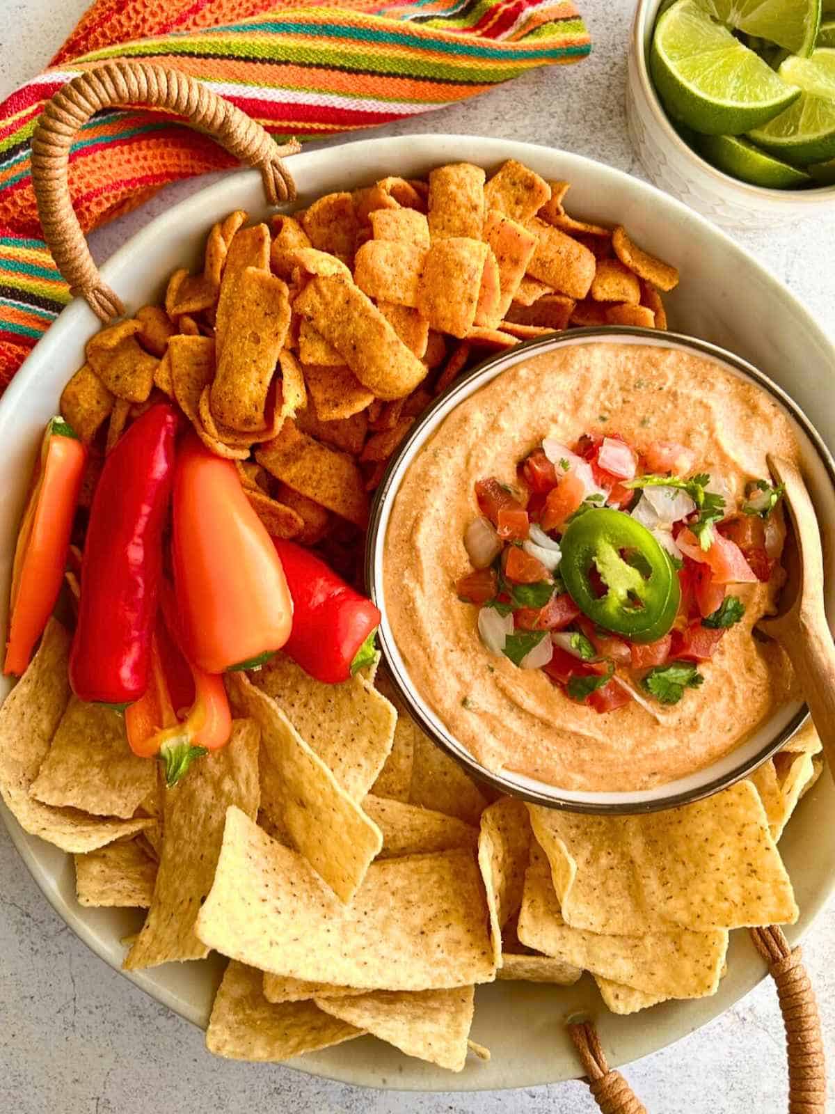 Cottage Cheese Taco Dip with Fritos and peppers.