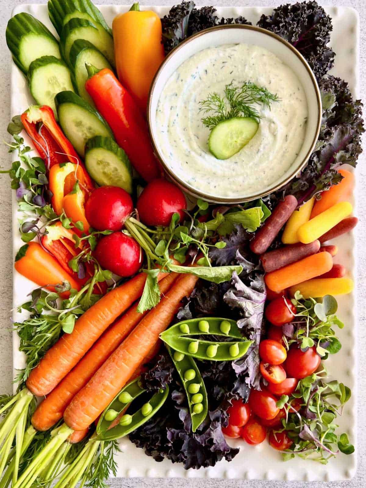 Cottage cheese ranch dip board with various veggies.