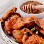 Wings tossed in hot honey sauce.