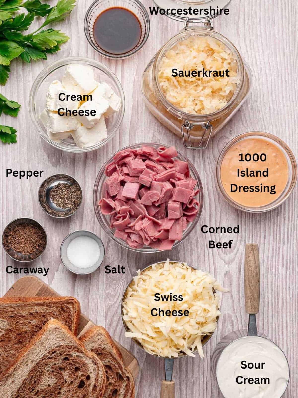 Ingredients needed to make hot baked reuben dip.