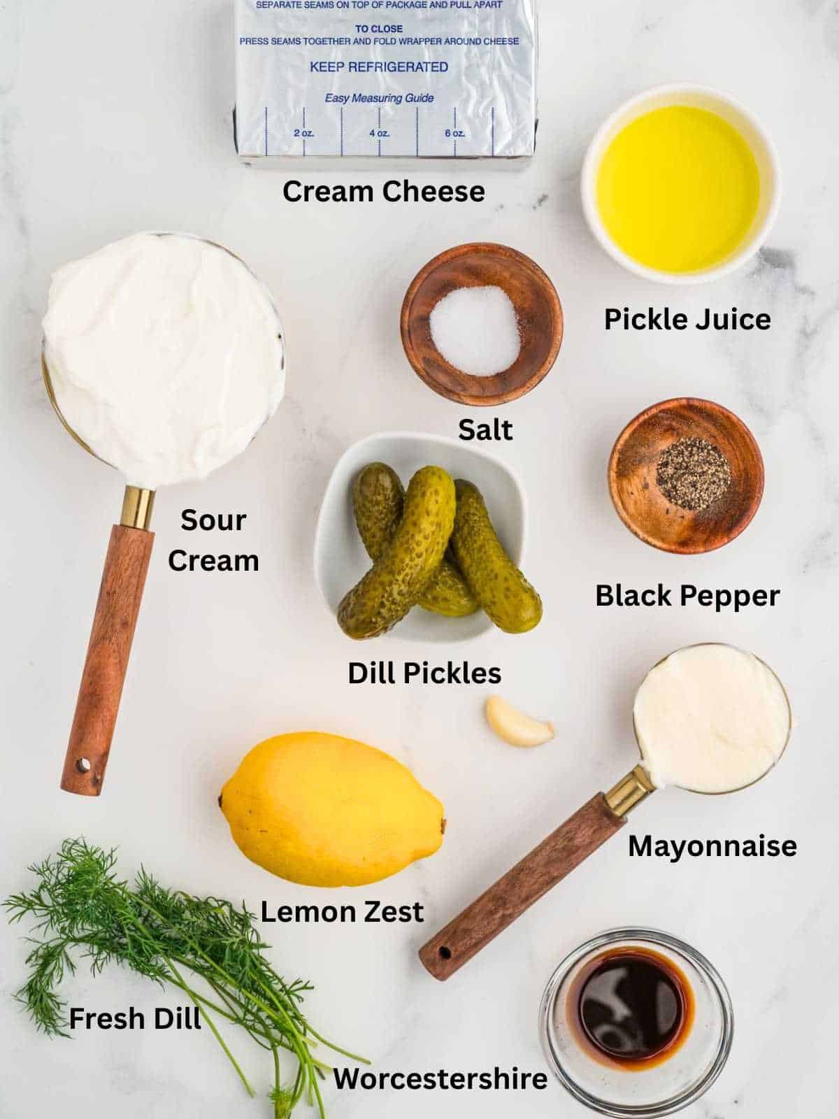 Ingredients needed to make dill pickle dip.