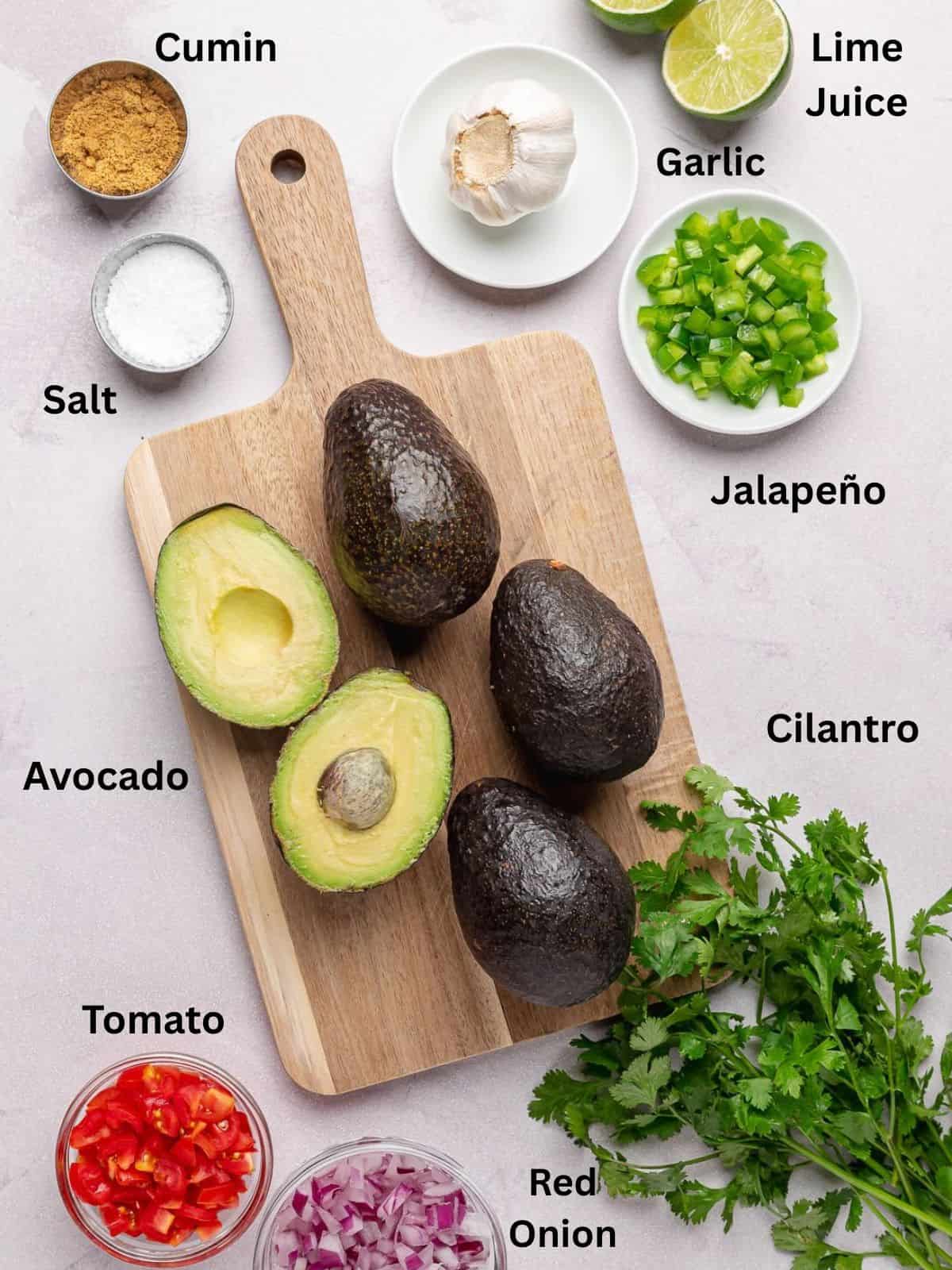 Ingredients needed to make the best guacamole recipe.
