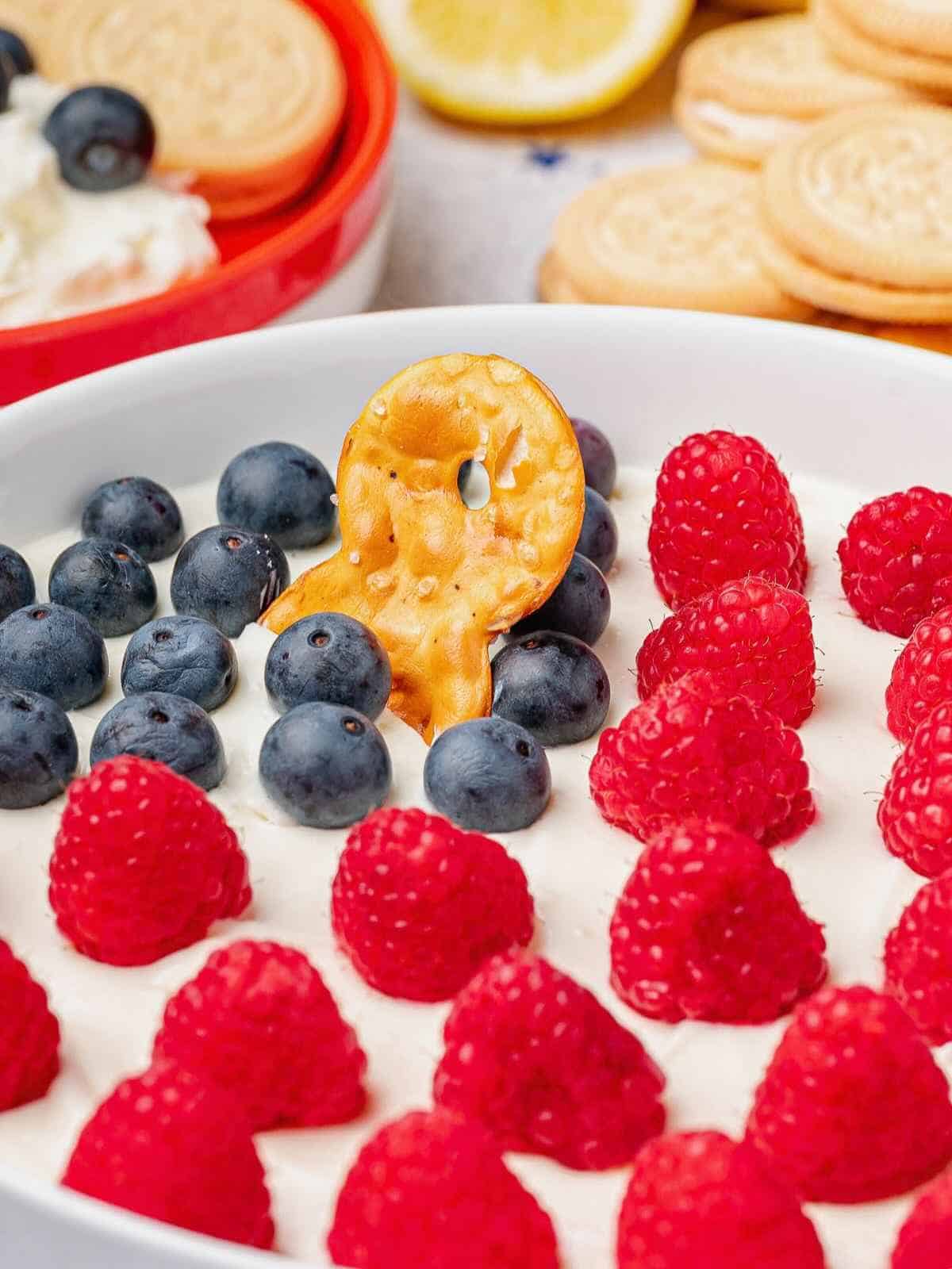 Pretzel crisp dipped into flag dip.