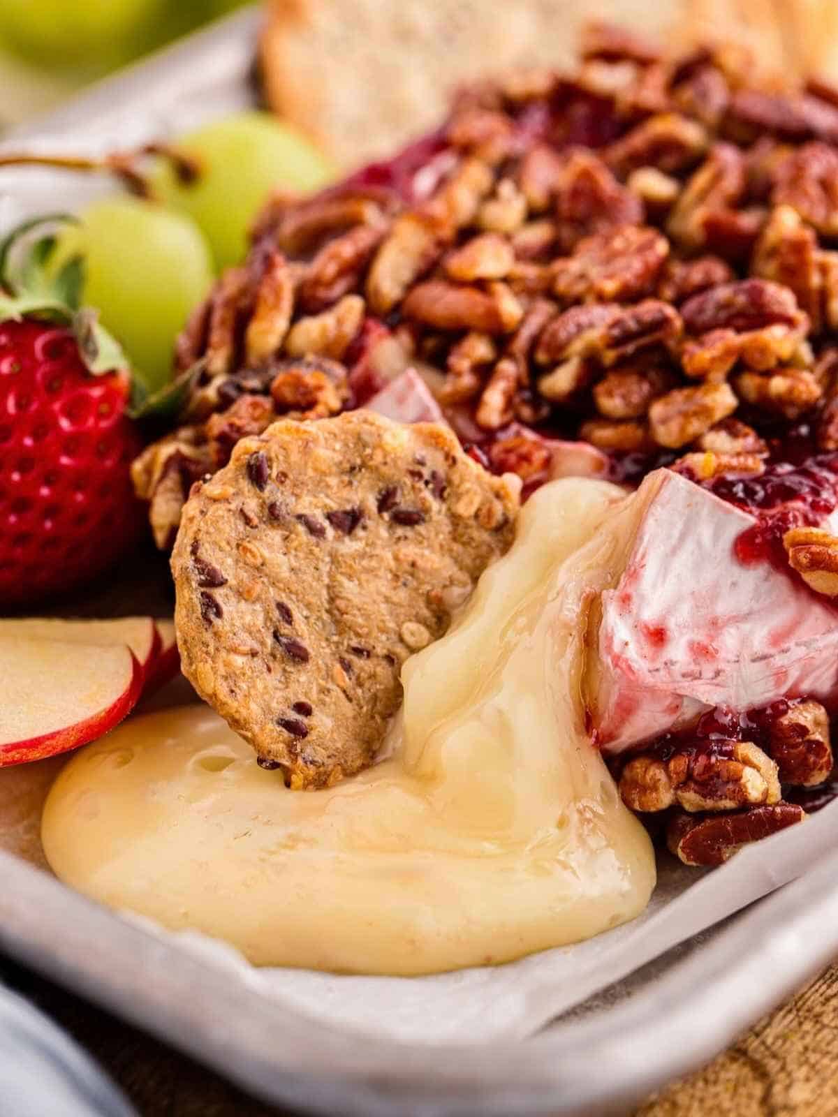 Brie oozing onto a platter.