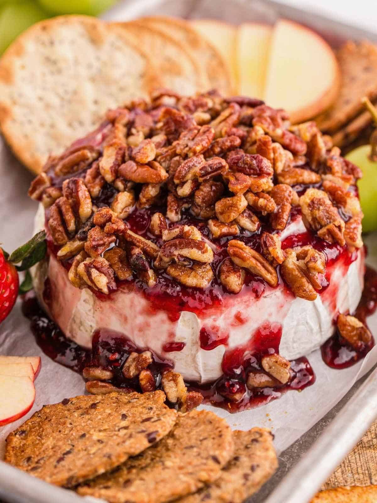 Brie with raspberry jam and pecans.
