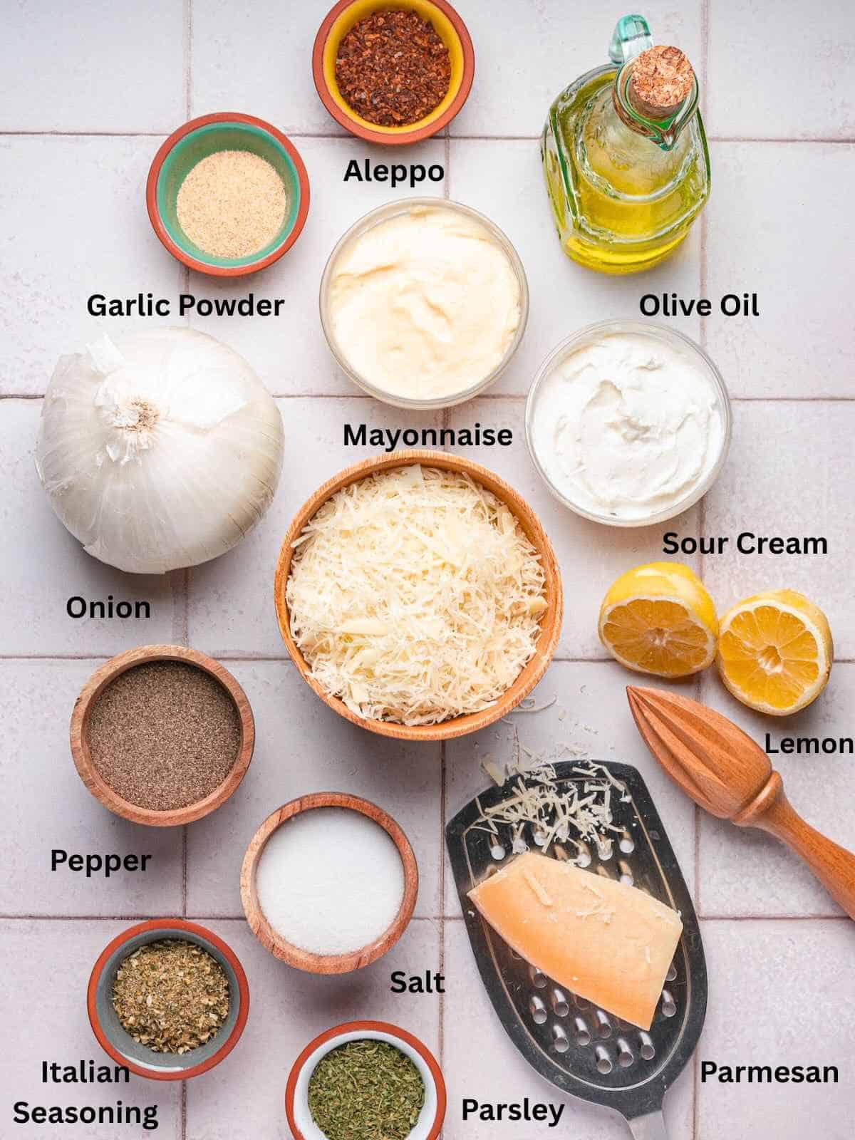 Ingredients needed to make Garlic herb dip and onion ring chips.