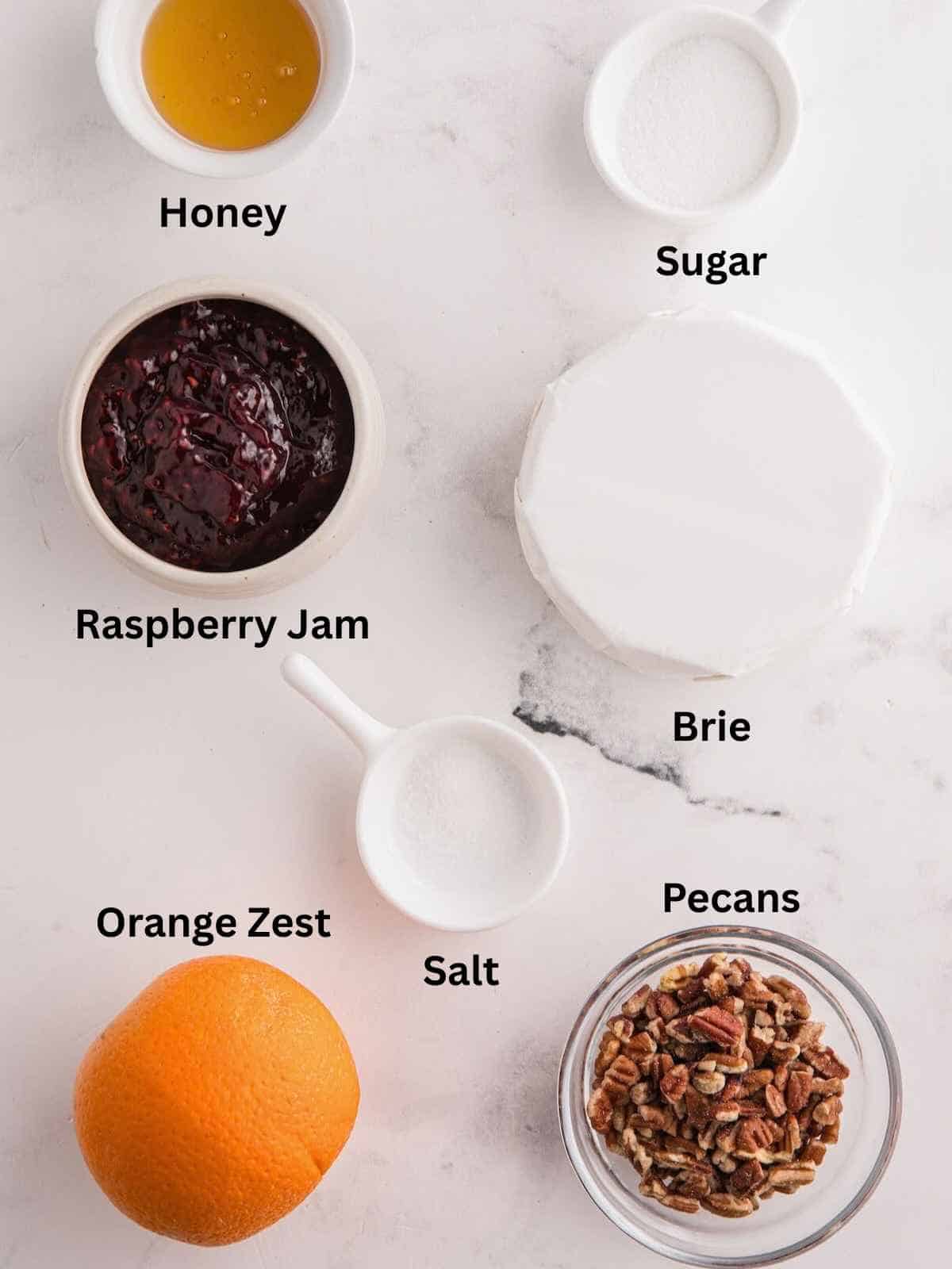 Ingredients needed to make Baked Brie with Jam.